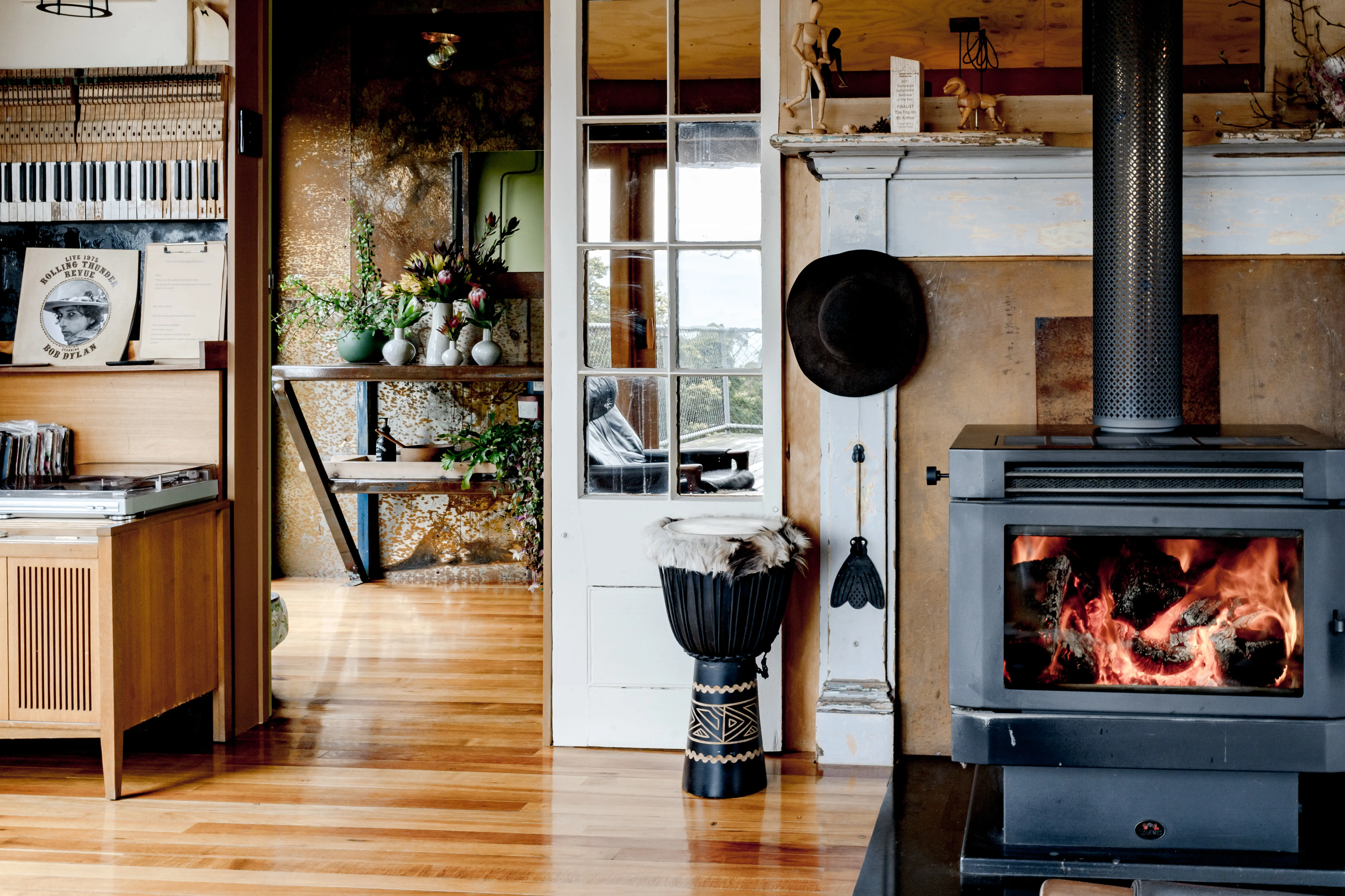 Shot of The Trig's interior with roaring fireplace and well thought out decor.
