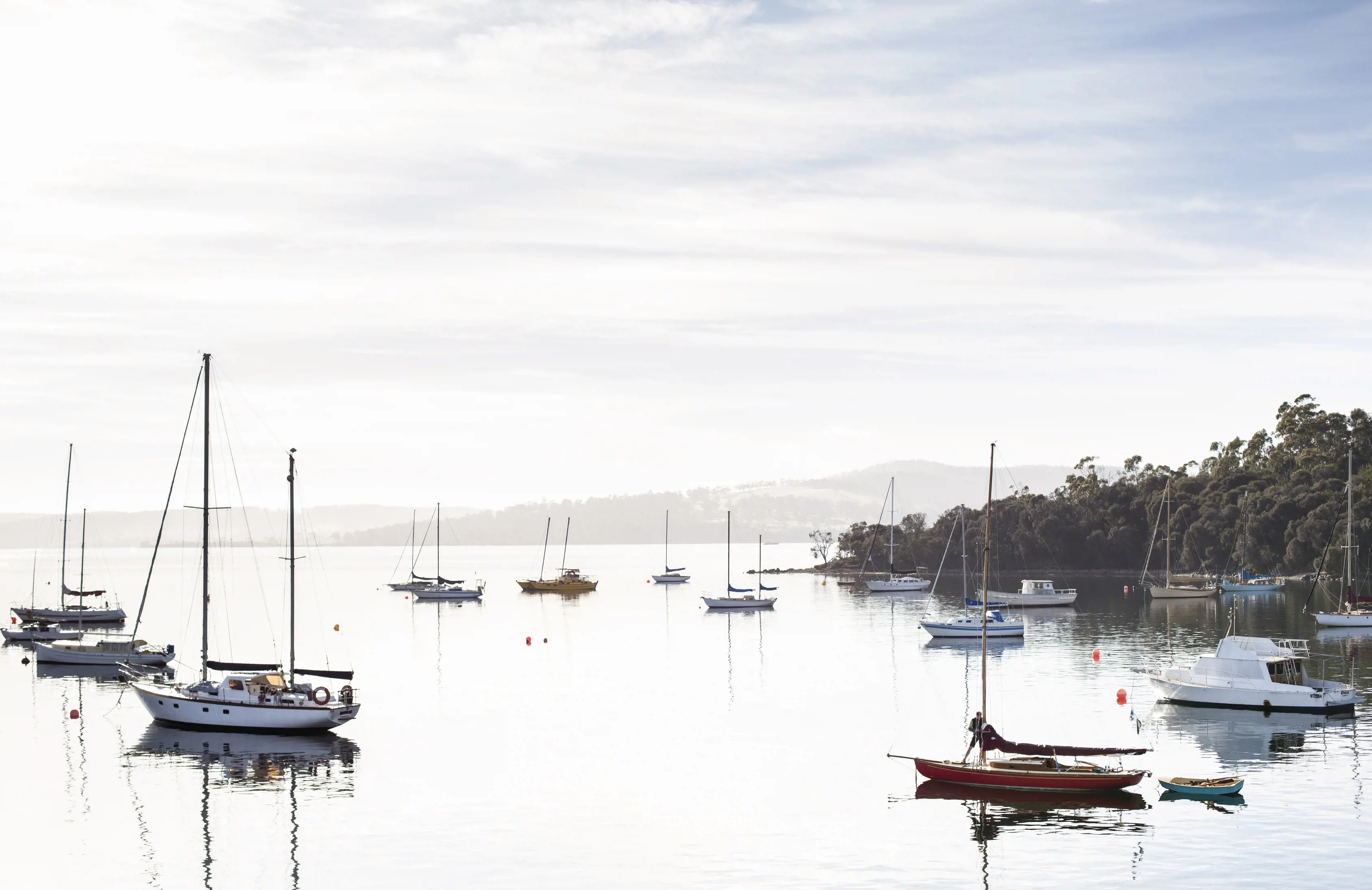 Overlooking a peaceful bay filled with sail boats in the quiet town of Kettering.