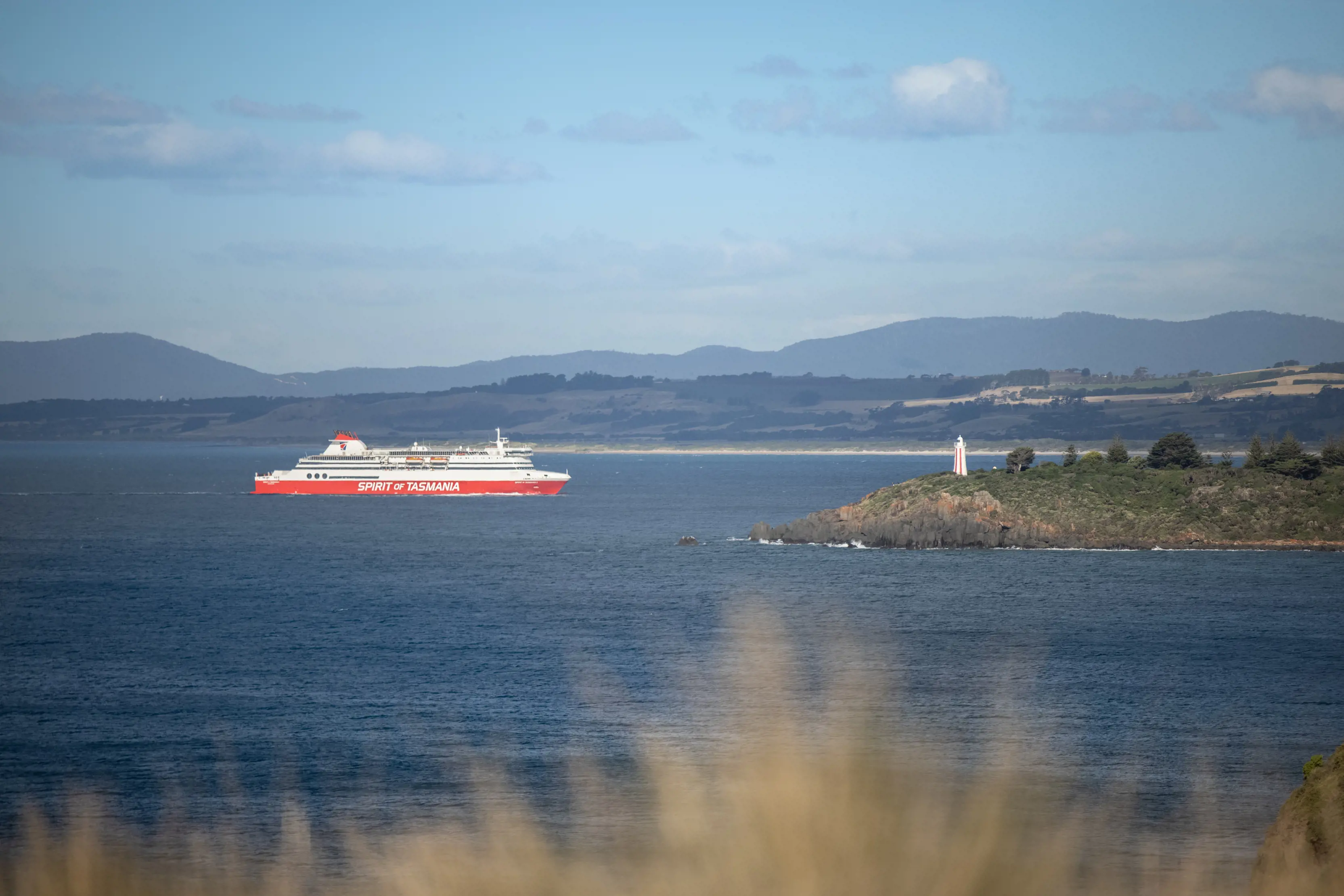 Image of the Spirit of Tasmania, cruise ship, just off the coast near the Mersey Bluff Lighthouse.